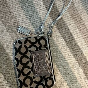EUC Coach Black and Silver poppy Wristlet
